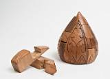 Wood, for Many Uses    Puzzle, made by victims of unexploded ordnance; Cambodia    MUS-2448.jpg  &copy 1990-2015 AJ Rye : souvenir, wood
